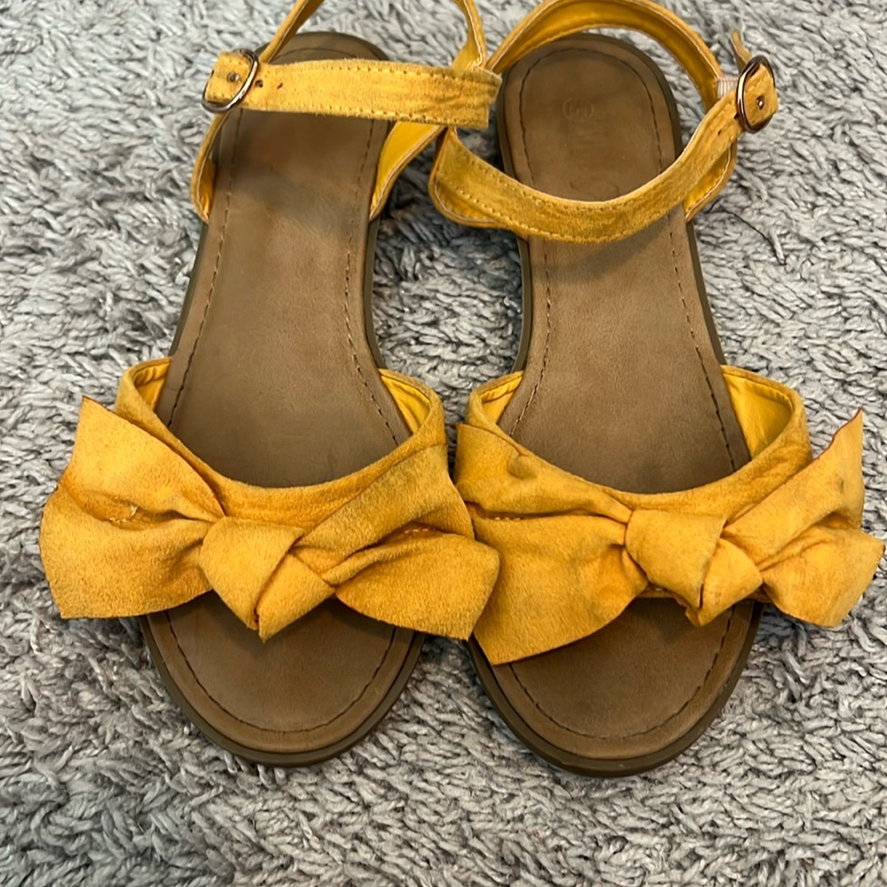 Yellow sandals , used . See pictures for details